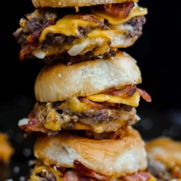 stack of three bacon cheeseburger sliders