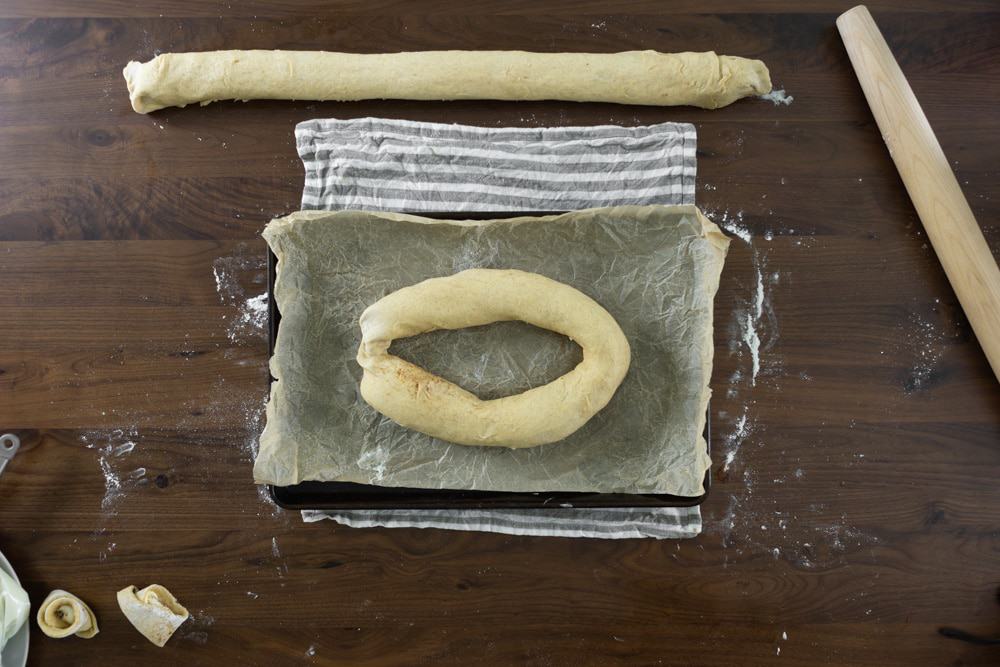 make king cake dough into an oval
