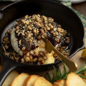 oozing melted baked brie in a cast iron skillet