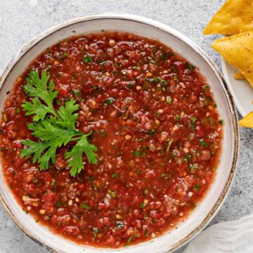 A large bowl of red salsa.