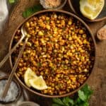 Blackened corn with lemon, parsley, and butter.