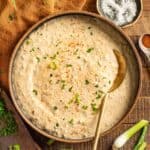 New Orleans remoulade sauce in a bowl with a spoon.