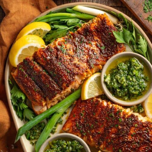 Baked blackened salmon with lemon and persillade sauce.