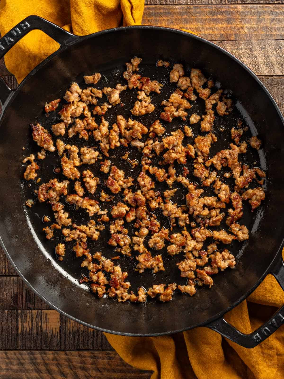 Sausage browed in a cast iron skillet.