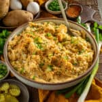 Cajun potato salad with a spoon.