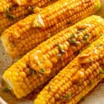 Cajun corn on the cob with spicy butter.
