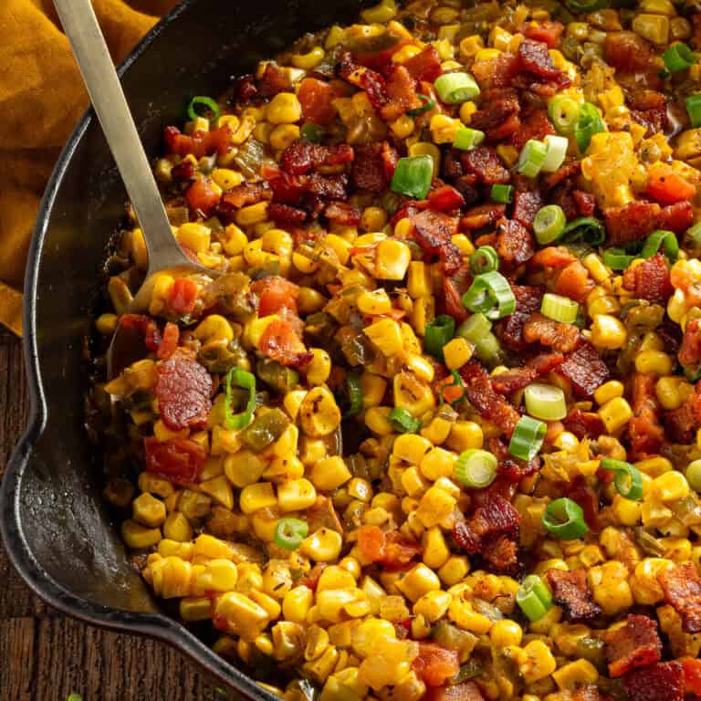 Cajun corn and tomatoes with bacon.
