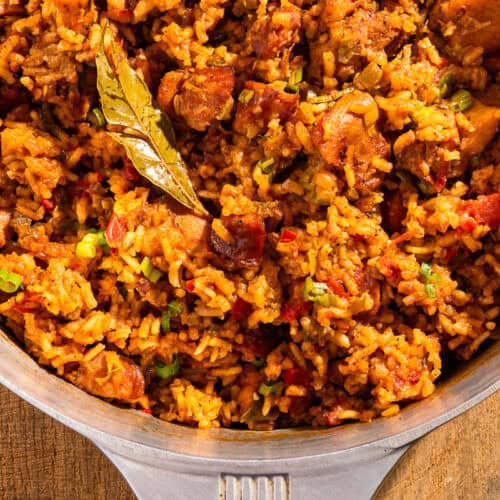 Chicken and sausage jambalaya in a Magnalite pot with a bay leaf.