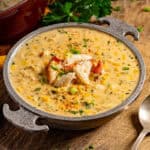 Crab and corn bisque with lump crab meat in a serving bowl.