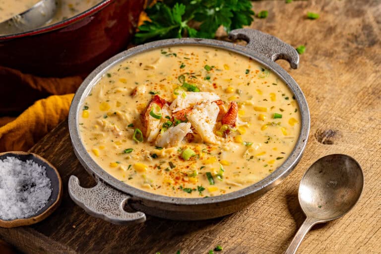 Crab and corn bisque with lump crab meat in a serving bowl.