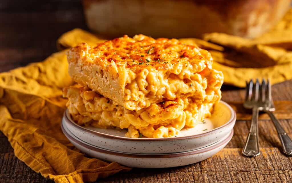 A plate of cajun baked mac and cheese slices.